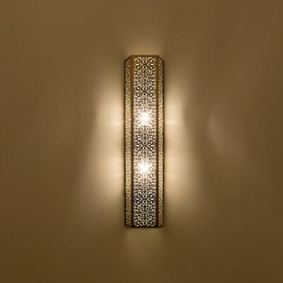 This stylish, shaded contemporary Moroccan wall light adds a touch of elegance and sophistication to any home decor. This stylish, shaded contemporary Moroccan wall light adds a touch of elegance and sophistication to any home decor.