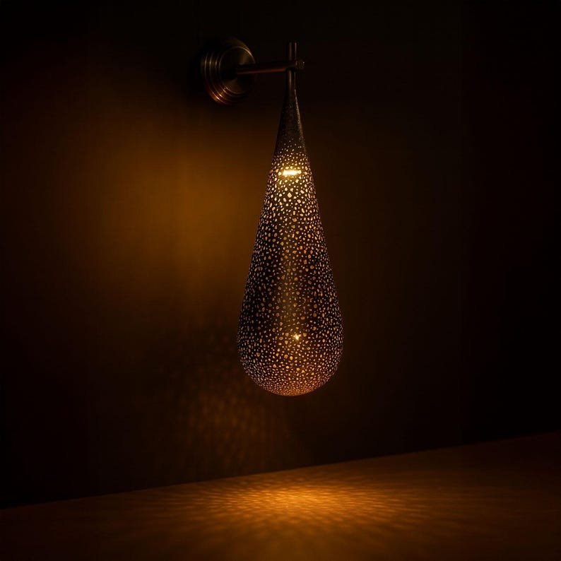 Handcrafted Pierced Metal Wall Lamp β Teardrop Design Antique Finish Sconce for Indoor & Outdoor Decor Handcrafted Pierced Metal Wall Lamp β Teardrop Design Antique Finish Sconce for Indoor & Outdoor Decor
