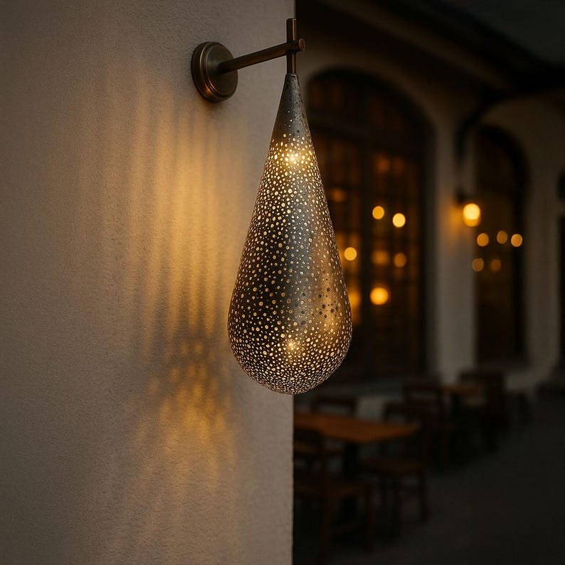 Handcrafted Pierced Metal Wall Lamp β Teardrop Design Antique Finish Sconce for Indoor & Outdoor Decor Handcrafted Pierced Metal Wall Lamp β Teardrop Design Antique Finish Sconce for Indoor & Outdoor Decor