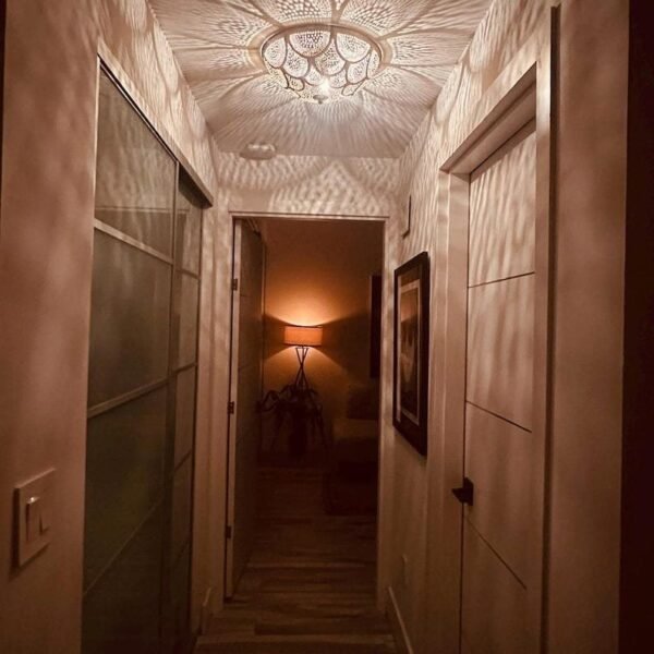 Scallop Pattern Hallway Lamp with Dramatic Ceiling Reflections ​