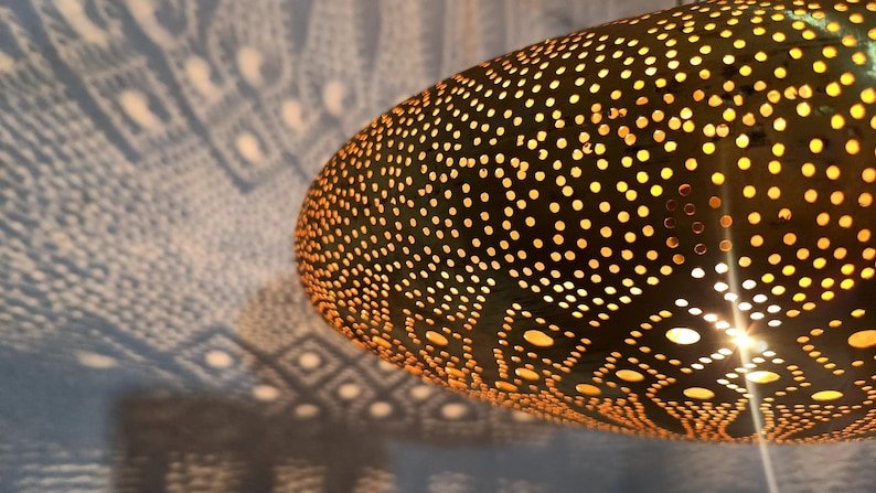 Moroccan Brass Pendant Light: Hammered Lantern with Intricate Shadow Pattern Moroccan Brass Pendant Light: Hammered Lantern with Intricate Shadow Pattern