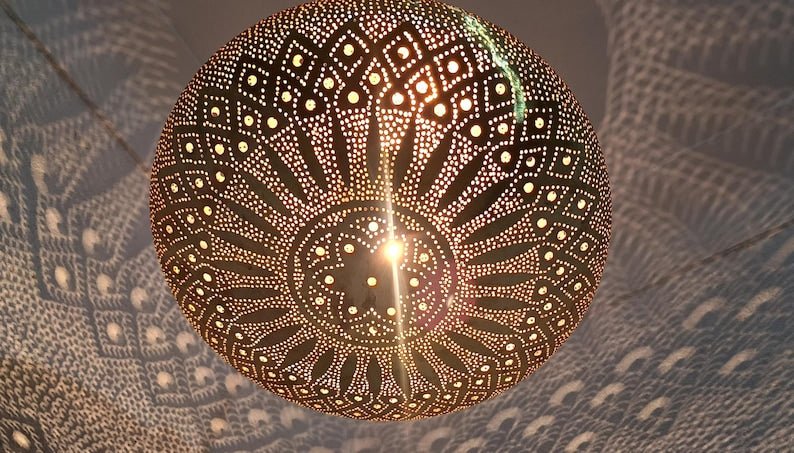 Moroccan Brass Pendant Light: Hammered Lantern with Intricate Shadow Pattern Moroccan Brass Pendant Light: Hammered Lantern with Intricate Shadow Pattern