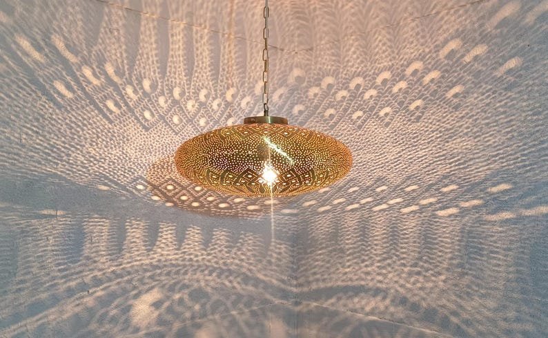Moroccan Brass Pendant Light: Hammered Lantern with Intricate Shadow Pattern Moroccan Brass Pendant Light: Hammered Lantern with Intricate Shadow Pattern