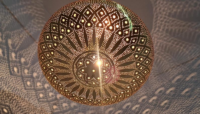 Moroccan Brass Pendant Light: Hammered Lantern with Intricate Shadow Pattern Moroccan Brass Pendant Light: Hammered Lantern with Intricate Shadow Pattern